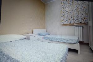 Postel nebo postele na pokoji v ubytování Casa del Bosco