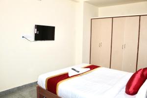Μια τηλεόραση ή/και κέντρο ψυχαγωγίας στο Relax Suites