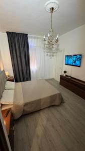 Postel nebo postele na pokoji v ubytování Fornaci-mare-wi fi , smart tv aria condizionata!
