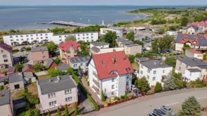 an aerial view of a small town with houses at Szyper 2 in Jastarnia