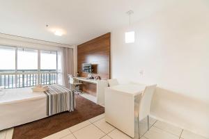 Ένα ή περισσότερα κρεβάτια σε δωμάτιο στο Vision Hotel em Brasília 06908