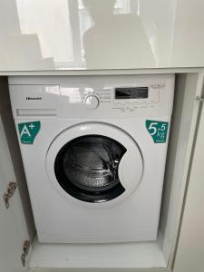 a washing machine is in a room at Atico Strandpromenaden in Torrevieja
