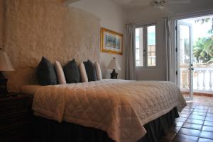Postel nebo postele na pokoji v ubytování Acacia Boutique Hotel