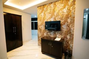 TV a/nebo společenská místnost v ubytování Vip Stays