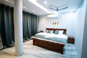 Postel nebo postele na pokoji v ubytování Vip Stays