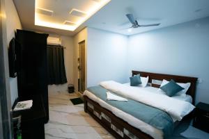 Postel nebo postele na pokoji v ubytování Vip Stays