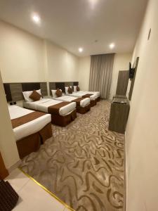 Voodi või voodid majutusasutuse Mila HOTEL MAKKAH toas