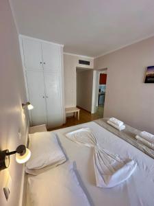 Voodi või voodid majutusasutuse Hotel Lenox toas