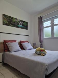 Cama o camas de una habitación en Gîte Ti jit la