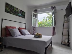 Cama o camas de una habitación en Gîte Ti jit la
