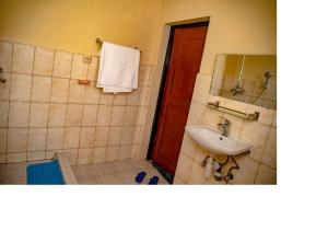 Koupelna v ubytování Bujumbura Hotel and Appartment
