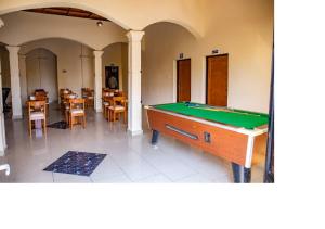 Biliár nebo kulečník v ubytování Bujumbura Hotel and Appartment