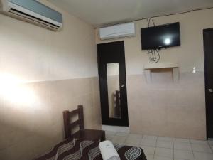 Μια τηλεόραση ή/και κέντρο ψυχαγωγίας στο Hacienda Cañada Rica 1