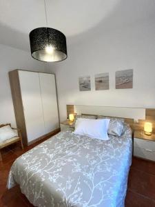 Ένα ή περισσότερα κρεβάτια σε δωμάτιο στο Alojamiento Casa Tía Mari +14 φωτογραφίες
