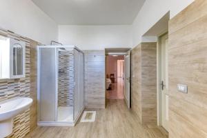 Koupelna v ubytování Palazzo Rondine - Affittacamere con cucina + 14 fotografií