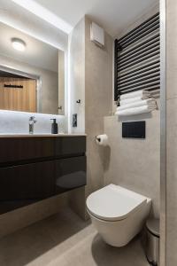 Un baño de Homewell Orange Soft Lofts