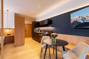 A kitchen or kitchenette at Appartement Erler