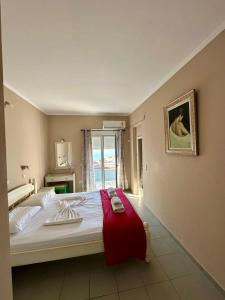 Voodi või voodid majutusasutuse Hotel Lenox toas