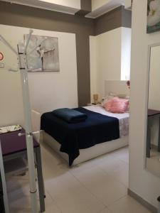 Postel nebo postele na pokoji v ubytování Hostel de las Facultades
