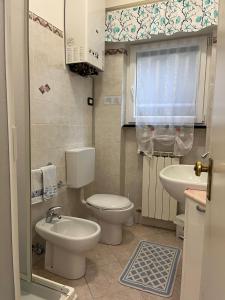 a small bathroom with a toilet and a sink at La Conchiglia di Monterosso in Monterosso al Mare +31 photos