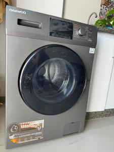 a washing machine is sitting on a counter at Vista al Mar in Pampatar