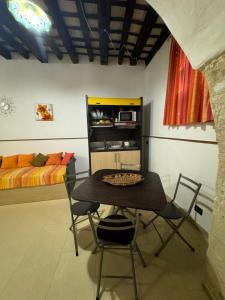 Ruang duduk di Agghiorna e Scura Rooms +49 gambar