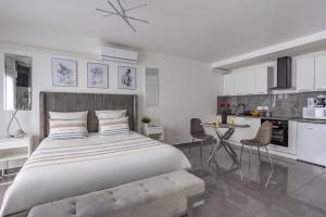 Kuchyň nebo kuchyňský kout v ubytování Suite avec jacuzzi & terrasse + 11 fotografií