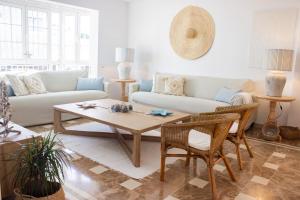 A seating area at LUXURY STYLE VILLA AURORA Roche