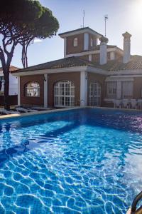 The swimming pool at or close to LUXURY STYLE VILLA AURORA Roche