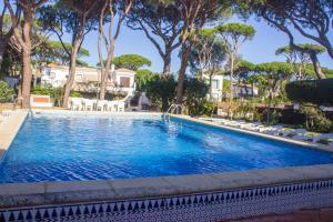 The swimming pool at or close to LUXURY STYLE VILLA AURORA Roche