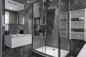 Koupelna v ubytování Suite avec jacuzzi & terrasse