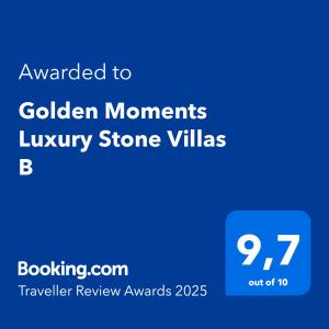 un cartello blu con il testo assegnato al Golden Moms Luxury Store Villas b di Golden Moments Luxury Stone Villas B a Mesariá