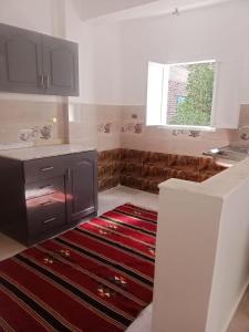 Køkken eller tekøkken på elomda