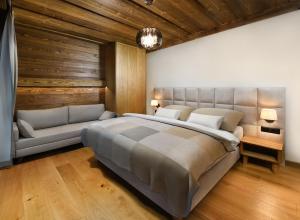 Postel nebo postele na pokoji v ubytování Chalet Oasis - Luxusná chata s výhľadom, pri Zuberci a Kvačianskej doline