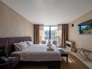 Ένα ή περισσότερα κρεβάτια σε δωμάτιο στο Regal Hotel Mitropoleos