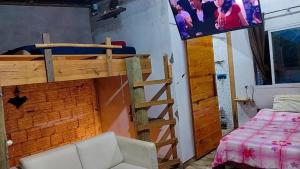 Ένα ή περισσότερα κρεβάτια σε δωμάτιο στο Casa Tércio