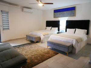 Кровать или кровати в номере Hotel Serenna