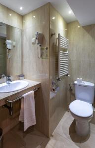 Koupelna v ubytování Hotel Micolau