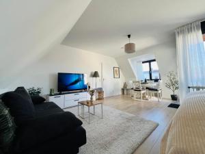 Μια τηλεόραση ή/και κέντρο ψυχαγωγίας στο Exklusive Loggia über der Altstadt