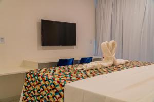 Μια τηλεόραση ή/και κέντρο ψυχαγωγίας στο Malia Resort By MAI +92 φωτογραφίες