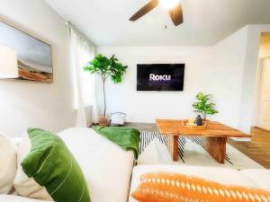 a living room with a couch and a table at Family Modern Oasis Lackland BMT Family Home 3 Bed 2 Bath in San Antonio