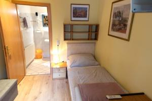 Letto o letti in una camera di Hotel Alter Telegraf