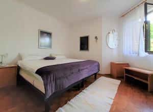 Postel nebo postele na pokoji v ubytování Family Apartments Cherry