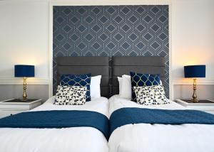 Letto o letti in una camera di MacKays