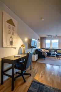 Posezení v ubytování Apartment with free indoor parking