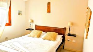 En eller flere senge i et værelse på Auberge de Cannedda + 23 billeder