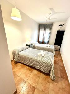 a room with two beds in a room at La Colina Beach & Golf in Ayamonte +30 photos
