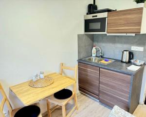 Kuchyň nebo kuchyňský kout v ubytování Apartmany215