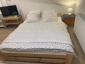 Postel nebo postele na pokoji v ubytování Apartmany215