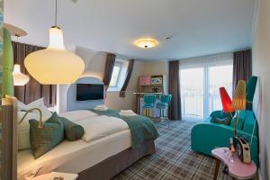 Postel nebo postele na pokoji v ubytování Bernstein Hotel "50`s Seaside Motel"